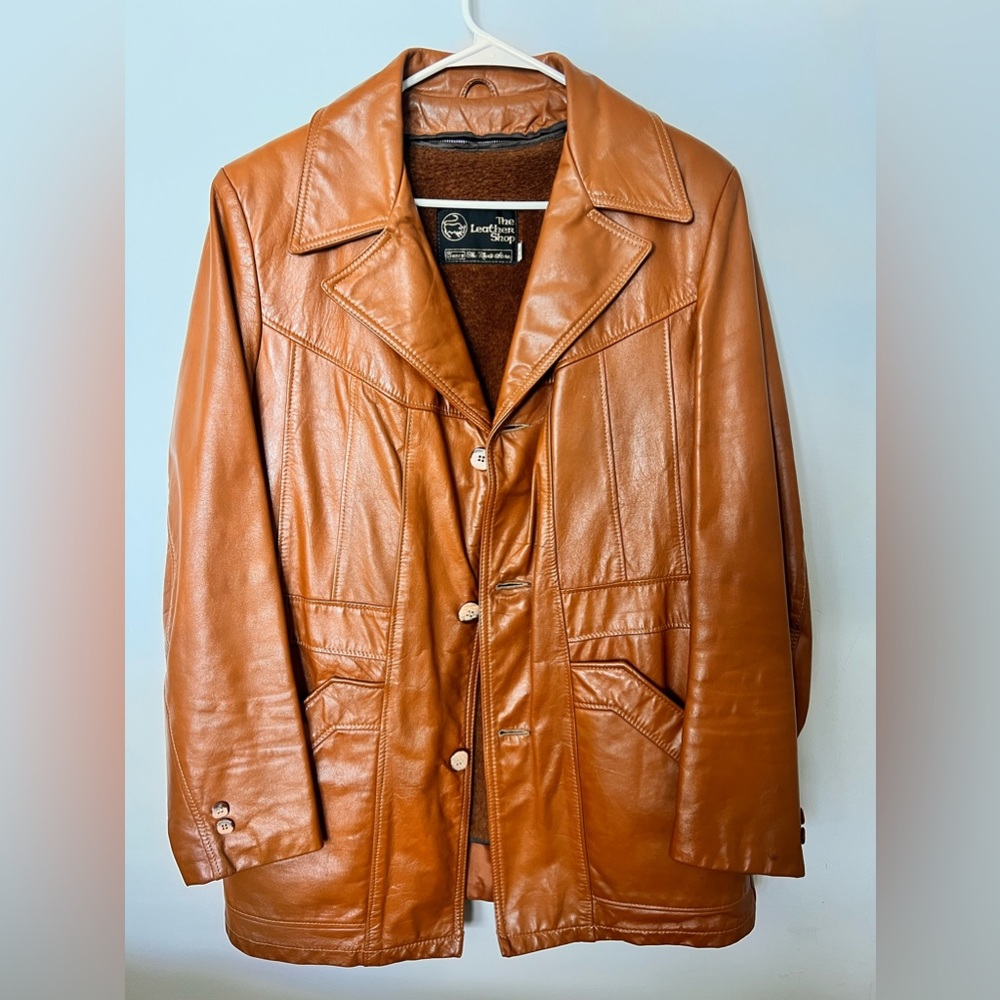 Is a light brown the leather shop sears jacket. 40 Regular